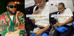 Lady who Davido gifted $5K causes a buzz online as she refuses to deposit it in the bank